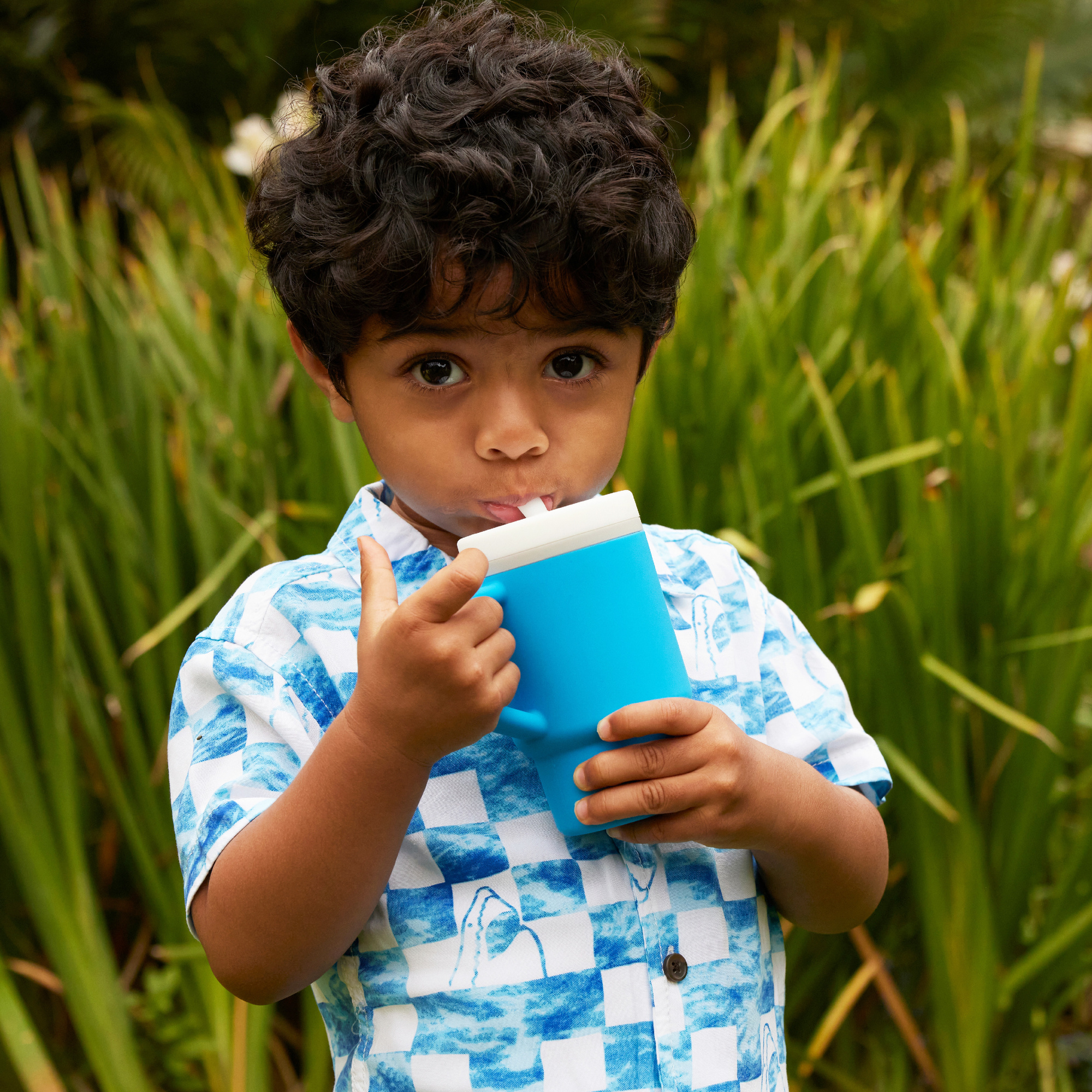 Bicchierino assortito in silicone morbido per bambini - primo bicchiere con beccuccio - INFANTINO
