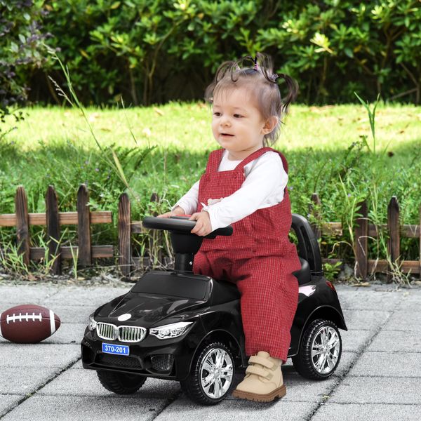 Macchinina per bambini cavalcabile con volante, fari e musiche integrate, in pp e metallo, 63.5x28x36 cm, nero - 