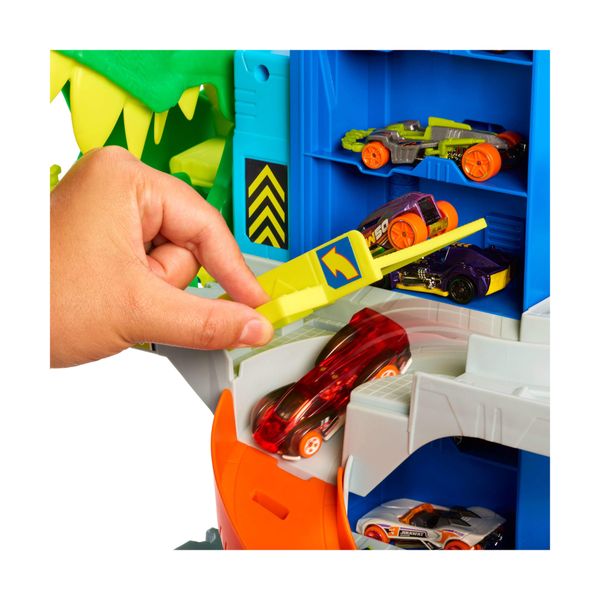 Hot wheels city, pista e playset mega garage del t-rex - Hot Wheels