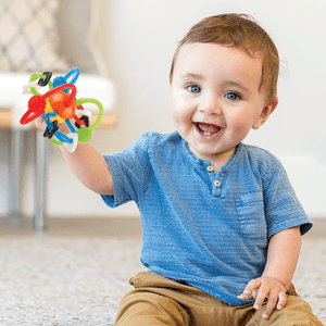 Sonaglio e massaggiagengive colorato - INFANTINO